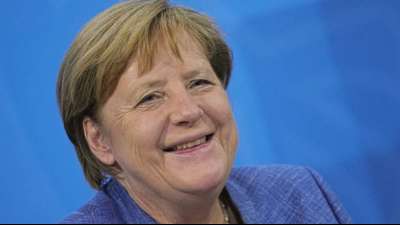 Merkel sieht Corona-Impfwettlauf mit Delta-Variante