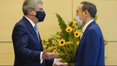 Gespr&auml;ch mit Bach: Japans Premier Suga nimmt IOC in die Pflicht