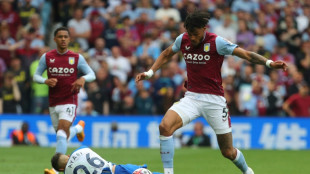 Villa defender Mings set for knee surgery