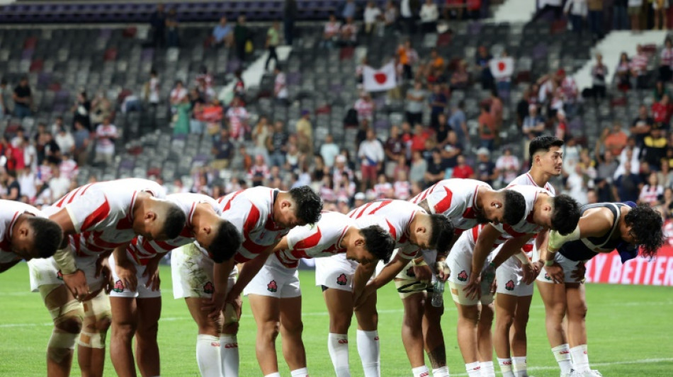 Japan win 'arm wrestle' to set up showdown for last-eight place