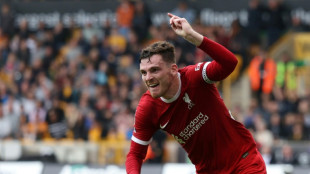 Liverpool beat Wolves 3-1 to top Premier League table