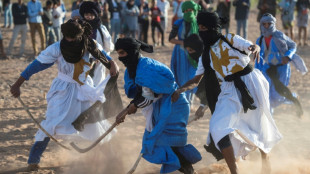 Moroccan nomads keep alive ancient sport of sand hockey