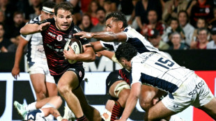 Dupont scores twice to send Toulouse to Top 14 summit