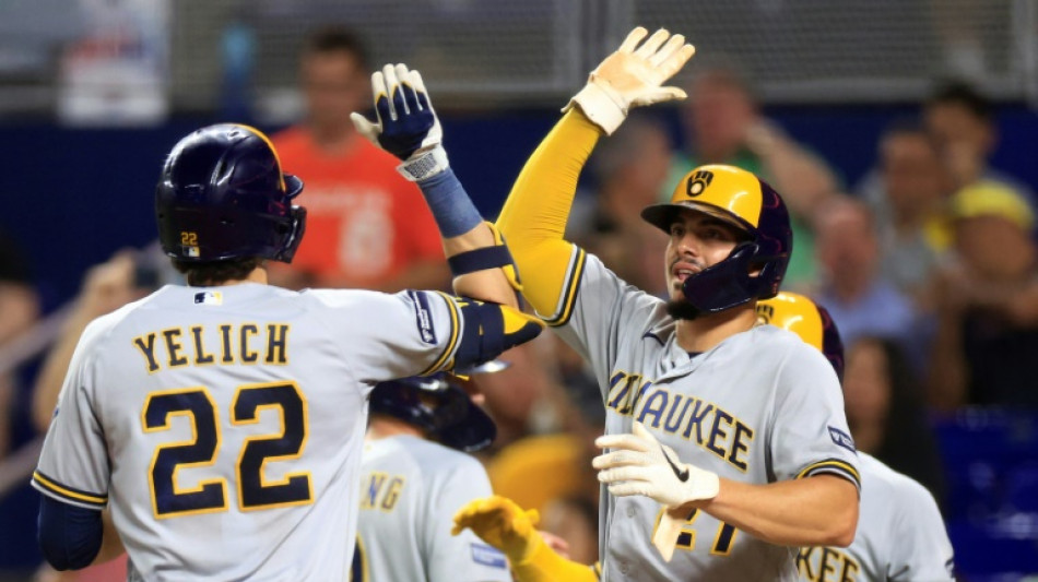 Brewers ride 12-run inning to victory, punch MLB playoff ticket