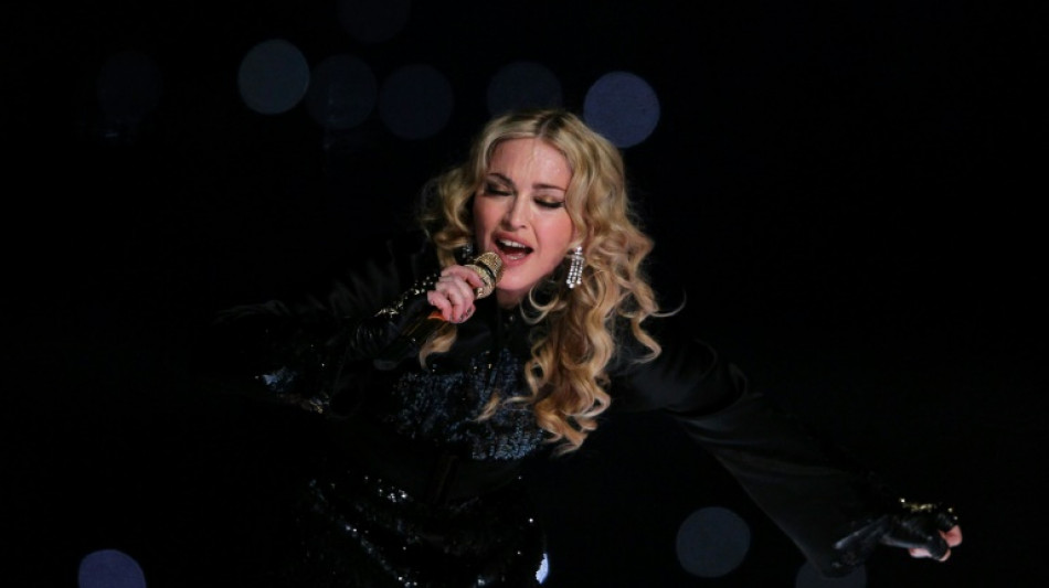 Madonna on 'road to recovery' after hospital stay