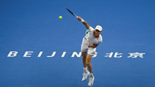 Sinner edges out Medvedev to win China Open