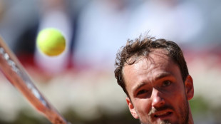 Medvedev squeezes past friend Shevchenko in Madrid