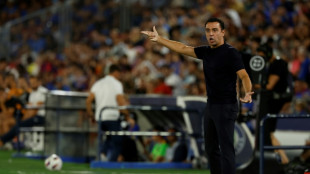Barca set up new home without suspended Xavi