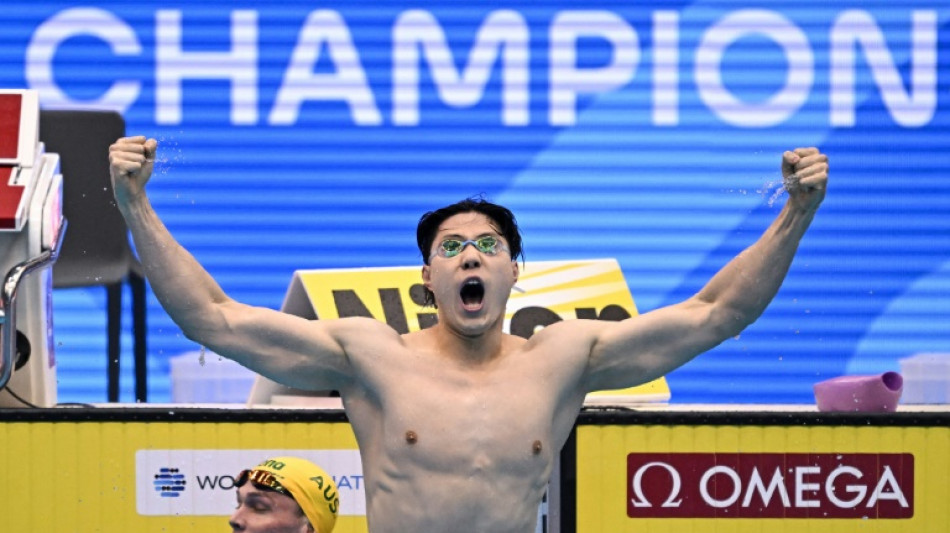 Breaststroke sensation Qin leads China swimming charge at Asian Games