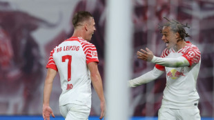 Leipzig thrash Stuttgart as Simons opens Bundesliga account