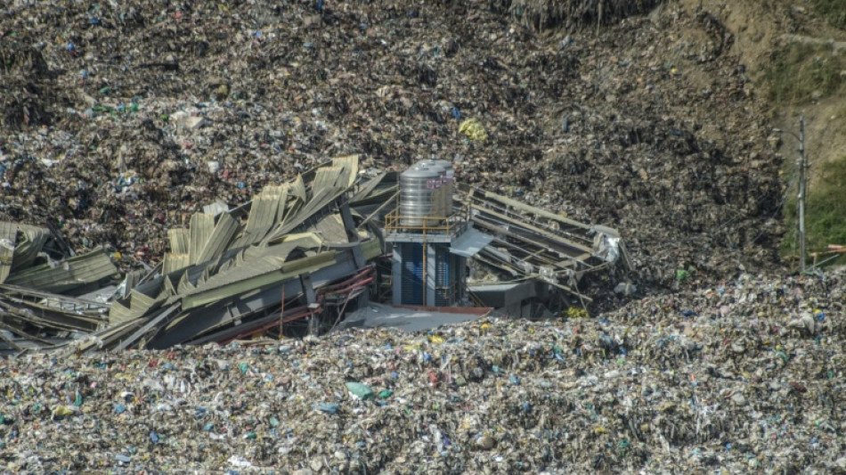 Death toll climbs after trash site collapse buries dozens in Philippines