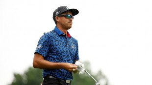 Fowler makes late charge to grab PGA lead at storm-hit Detroit