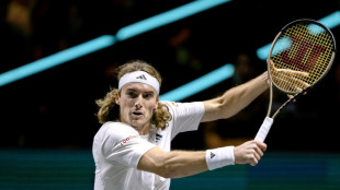 Tsitsipas wins after long wait in Miami