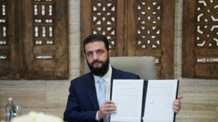 Syria's leader agrees truce with Kurds after govt troops advance