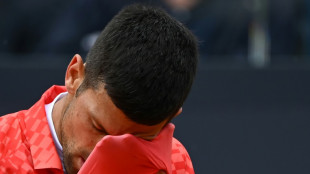 Djokovic knocked out of Italian Open by 20-year-old Rune