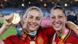 Spanish football boss apologises for kissing World Cup star 