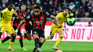 Nkunku fires Milan top of Serie A, Hojlund keeps Napoli in touch