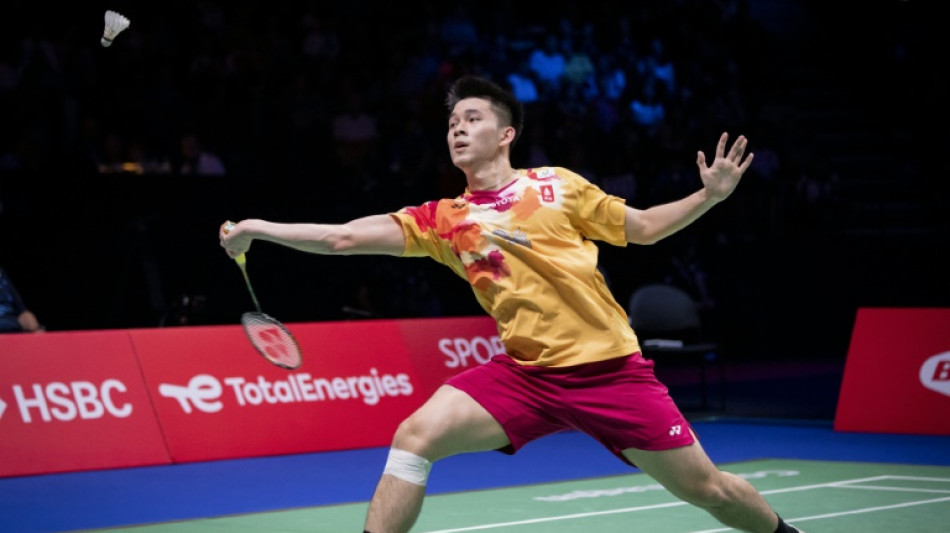 Thailand's Kunlavut spills blood to win badminton world crown