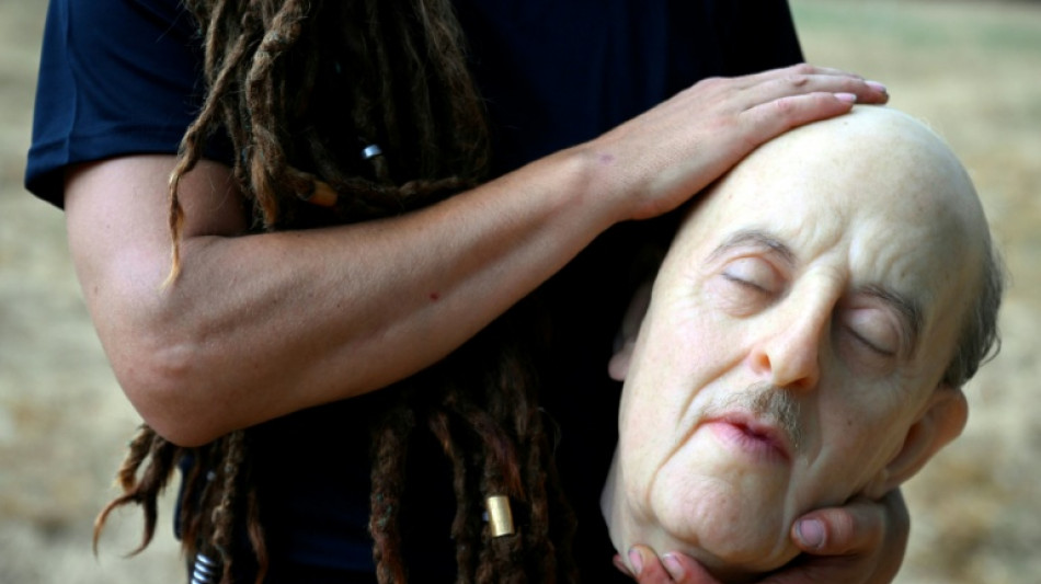 Footballers play with Franco head at Spain art festival