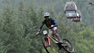 'Cold and shaking' Hatton wins mountain bike world gold