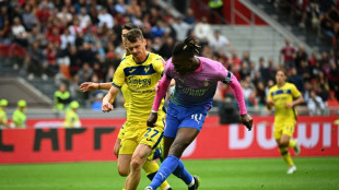 Leao fires Milan level with leaders Inter, Juve fall at Sassuolo