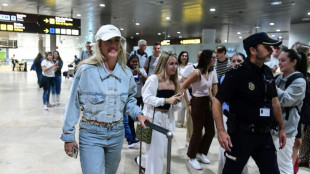 Striking Spain players arrive at training camp as dispute continues