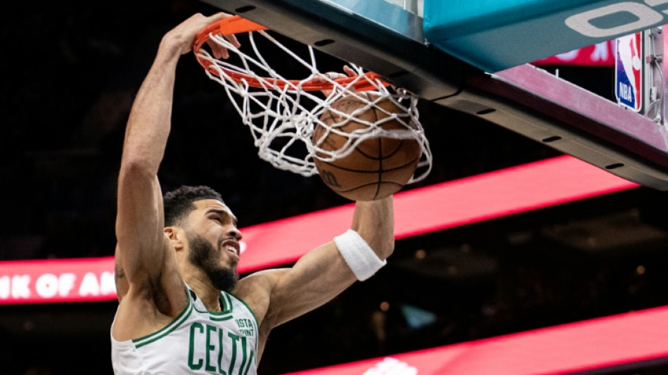 Tatum half century as Celtics pound Hornets