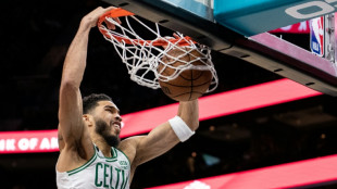 Tatum half century as Celtics pound Hornets