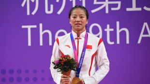 China's Wu sets sights on Olympics, Dusmatov rails at boxing schedule