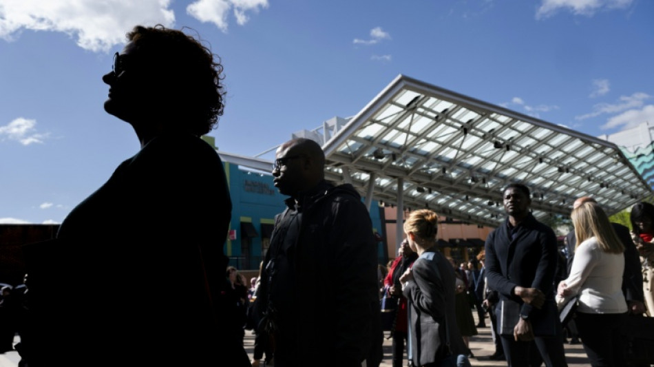 US hiring soars past expectations as unemployment edges down