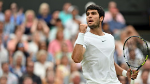 Alcaraz toughs it out to reach Wimbledon last 16