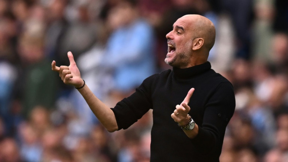 Guardiola urges Grealish and Doku to fight for Man City place