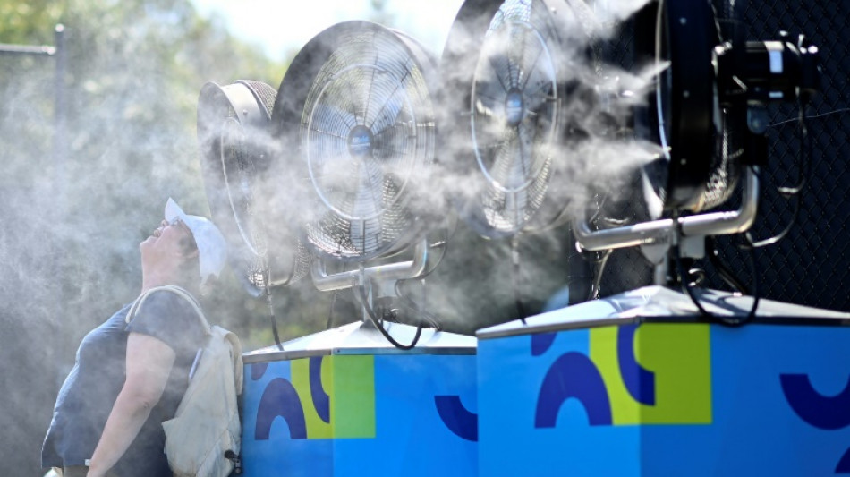 Heat and rain cause havoc at Australian Open