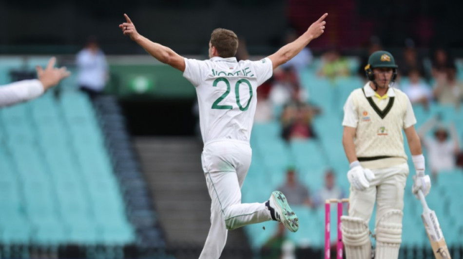 Nortje's double strike leaves Australia at 147-2 on rain-hit day
