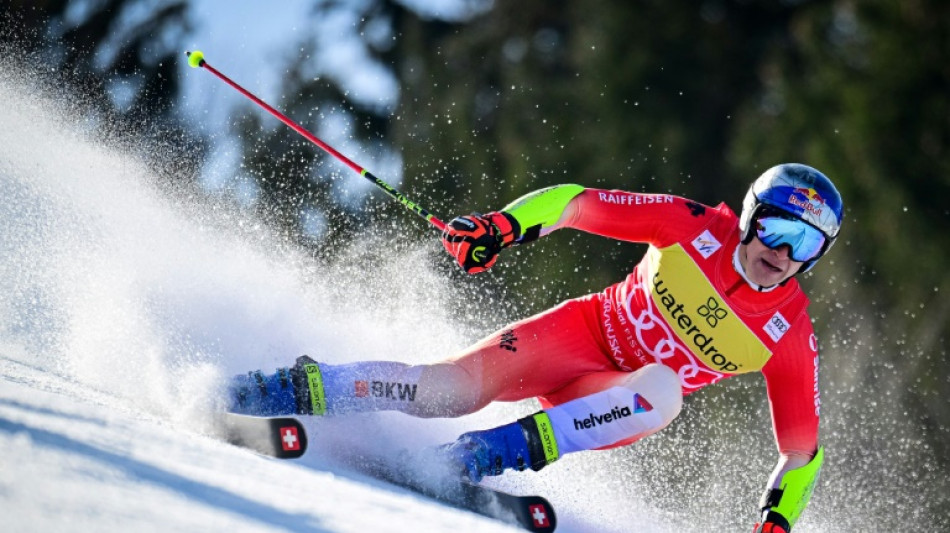 Odermatt wins giant slalom to seal World Cup overall title 