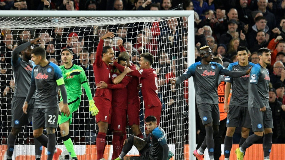Liverpool end Napoli's unbeaten run but fall short of top spot