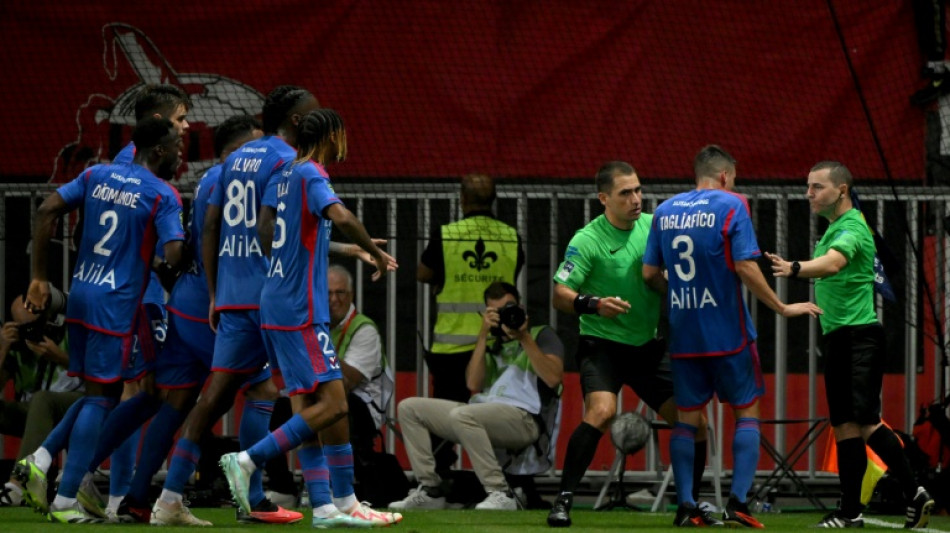 Crisis-hit Lyon carve out first point of Ligue 1 season