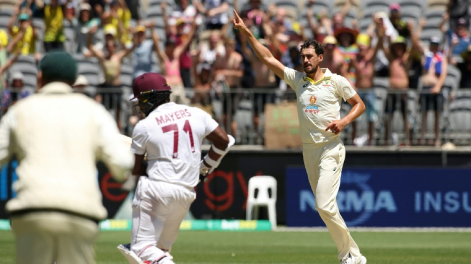 Australia's Cummins nets 200th Test wicket as West Indies battle on