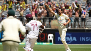 Australia's Cummins nets 200th Test wicket as West Indies battle on
