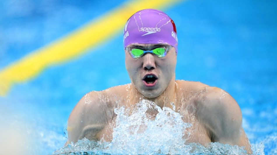 China in control as backstroke king Qin sets new Asian Games mark