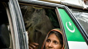 Pakistan's Kashmiris return to homes, but keep bunkers stocked
