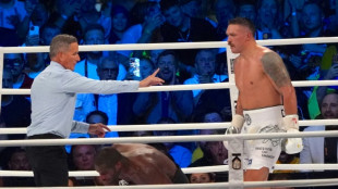 Usyk stops Dubois to retain world heavyweight titles