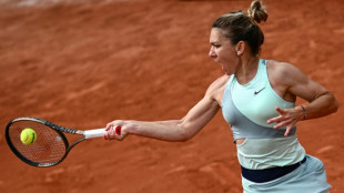 Halep says will fight to clean name after doping suspension