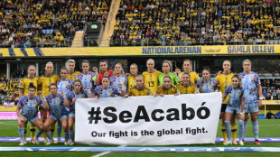 Spain and Sweden women's footballers stage 'It's over' protest