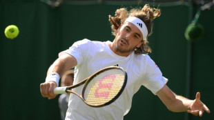 Murray braces for Tsitsipas showdown at Wimbledon as Wawrinka advances