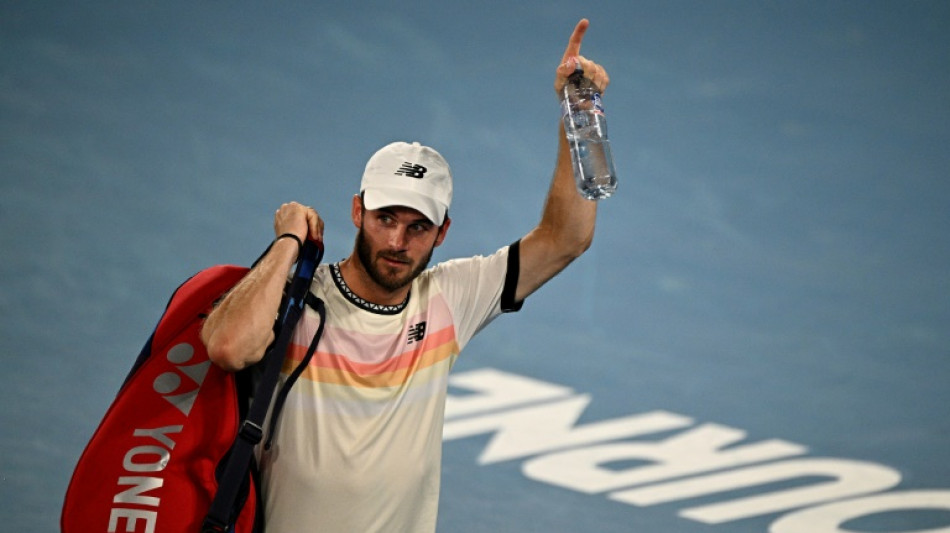 Paul wins Australian Open 'war' to set up all-American quarter