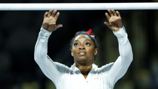 Biles will open on uneven bars in return to competition