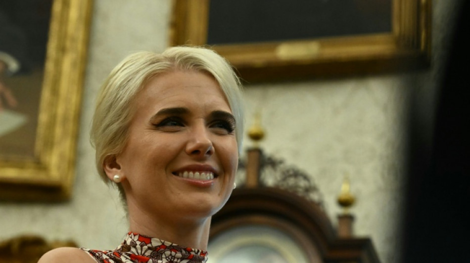 Trump's devoted 'human printer' in media glare