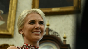 Trump's devoted 'human printer' in media glare