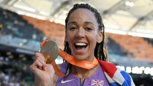 Johnson-Thompson puts injuries behind her to win heptathlon world gold